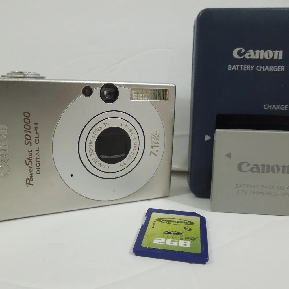 Canon PowerShot SD1000 7.1MP Digital Elph Camera with 3x Optical Zoom - Picture 1 of 8